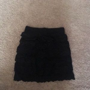 Black mini, high waisted skirt.